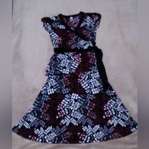 This is a two piece top and skirt outfit. Brand is Merona and Size is XS.